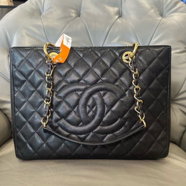 Chanel Grand Shopping Tote, Black / gold hardware, condition grade A
