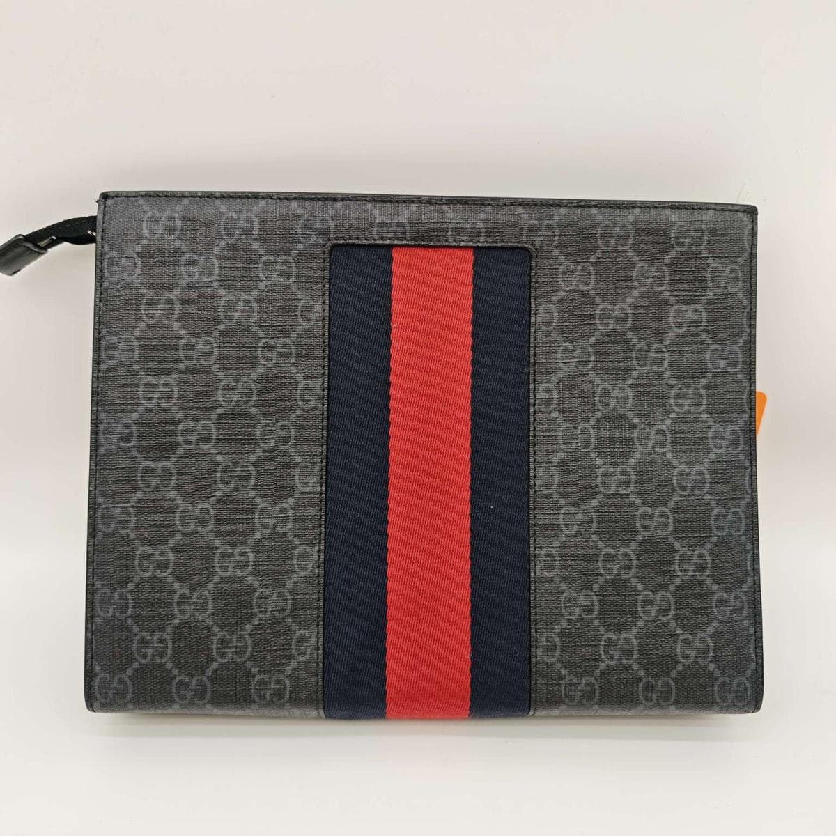 Gucci GG Supreme Clutch — photo 1