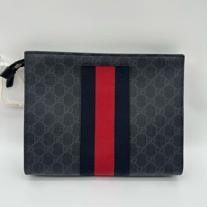 Gucci GG Supreme Clutch — photo 1