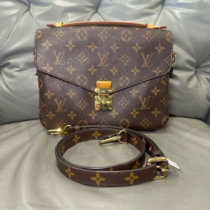 Louis Vuitton Monogram Messenger Bag, Brown, condition grade A