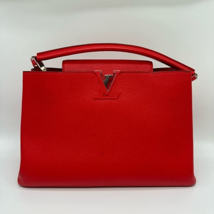 Louis Vuitton Capucines (large), Red, condition grade A