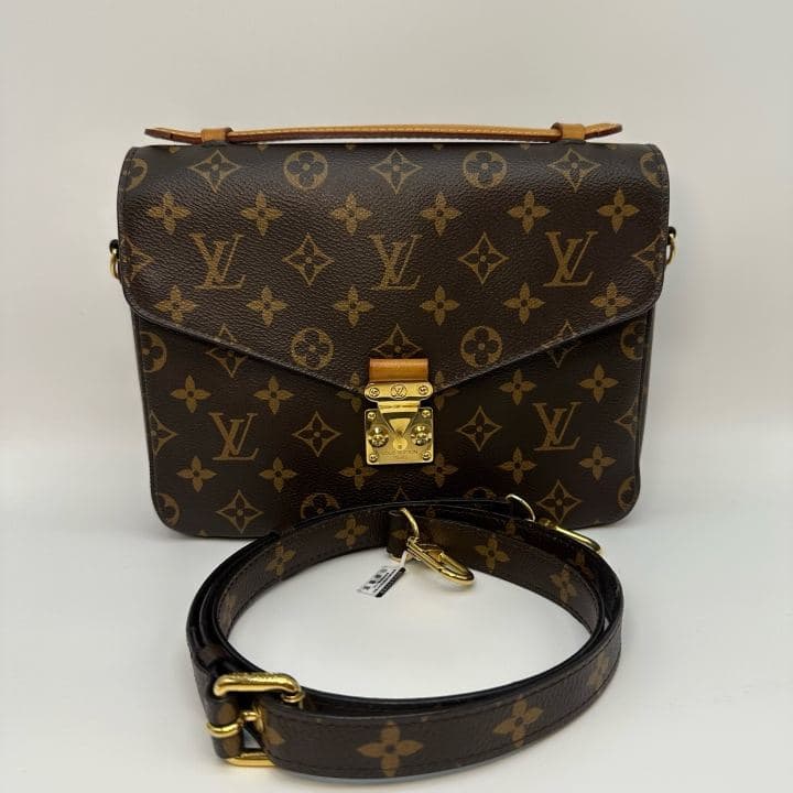 Louis Vuitton Monogram Messenger Bag, Brown, condition grade A