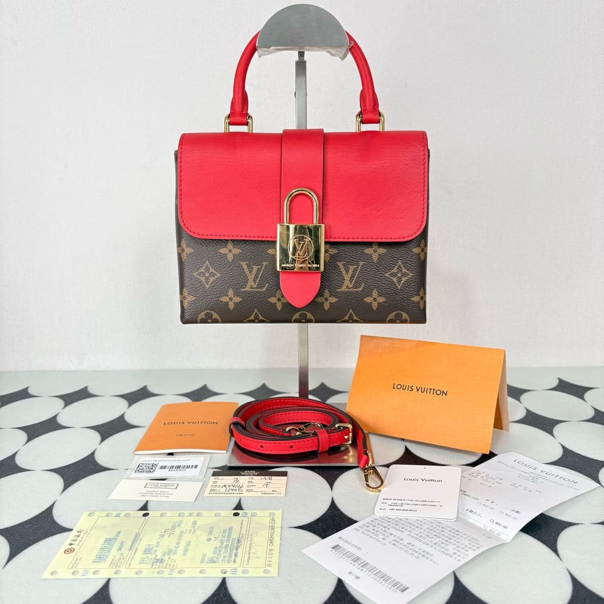 Louis Vuitton Locky BB, Brown / Red, condition grade A