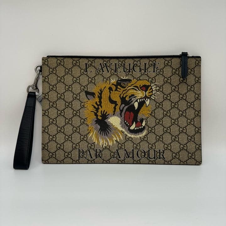 Gucci GG Canvas Clutch — photo 1