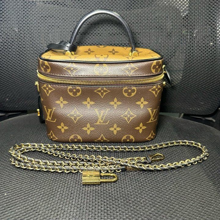 Louis Vuitton Vanity Case, Brown, condition grade A