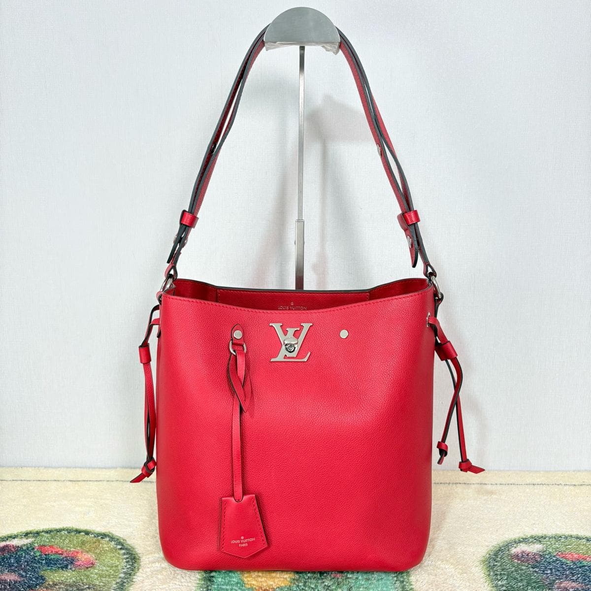 Louis Vuitton LockMe Bucket, Red, condition grade A
